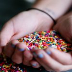 Person Holding Full of Sprinkles by Sharon McCutcheon